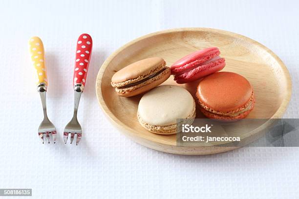 Colourful French Macaroons On White Background Stock Photo - Download Image Now - Backgrounds, Baked, Color Image