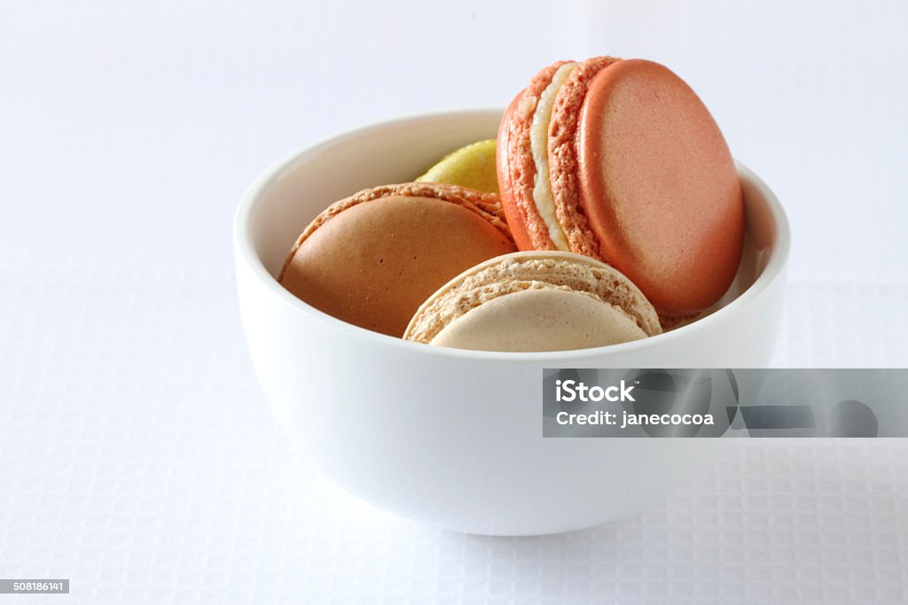 colourful french macaroons on white background Sweet and colourful french macaroons on white background Backgrounds Stock Photo