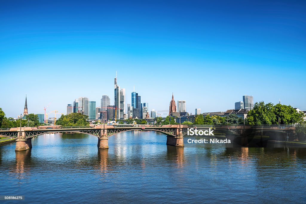 Frankfurt am Main, Germany bridges over the Maine River and the  skyscrapers of Frankfurt am Main, Germany Frankfurt - Main Stock Photo