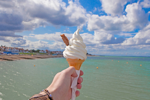 Enjoying ice cream on Herne Bay Beach