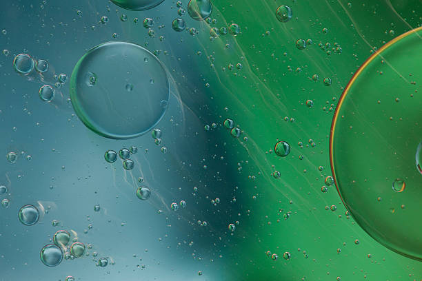 istock Abstract pattern of colored oil bubbles on water 508188151