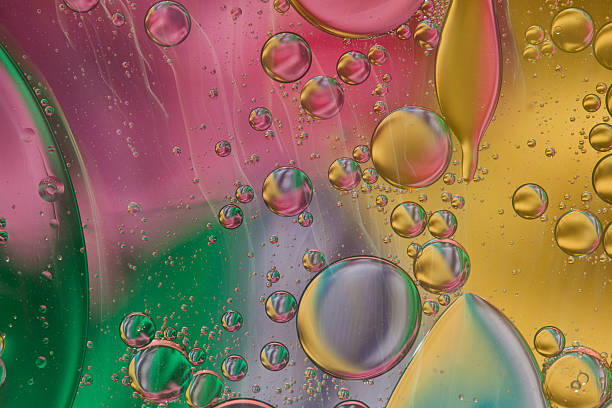 istock Abstract pattern of colored oil bubbles on water 508188171