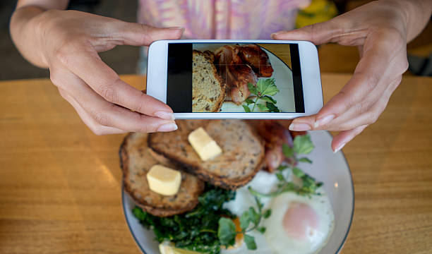 istock Woman using food app on her cell phone 508188398