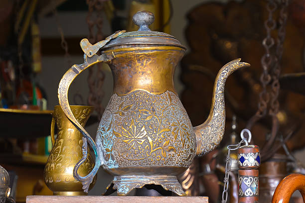 istock Old brass kettle, artfully decorated with stamping 508189496