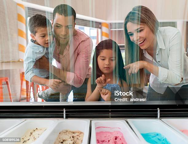 Family At An Ice Cream Shop Stock Photo - Download Image Now - Ice Cream, Ice Cream Parlor, Family
