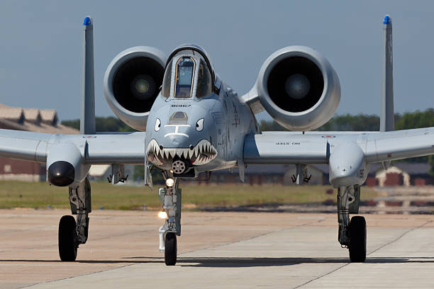 The A-10 Thunderbolt II at Langley AFB Hampton, USA - May 15, 2011: The Fairchild Republic A-10 Thunderbolt II at the Langley Air Force Base located in Hampton, VA during The 2011 Air Power Over Hampton Roads Open House and Air Show on May 15, 2014. The A-10 more commonly known as Warthog or Hog is a twin-engine jet aircraft  designed for close air support of ground forces. a10 warthog stock pictures, royalty-free photos & images