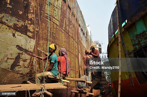Locals Are Repairing Ship In Dhaka Stock Photo - Download Image Now - Asia, Asian and Indian Ethnicities, Bangladesh