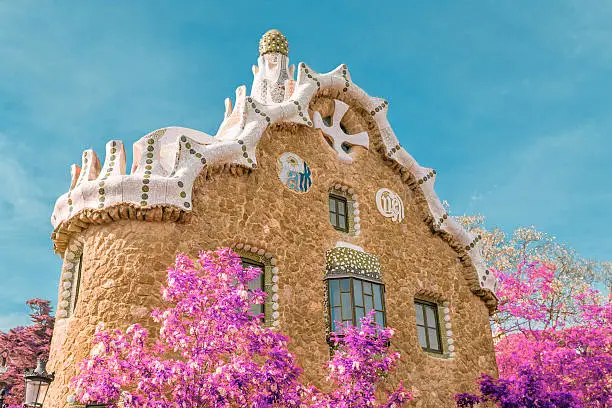 Fairy tale house in Park Guell, Barcelona, Spain. Infrared (pink) shot.