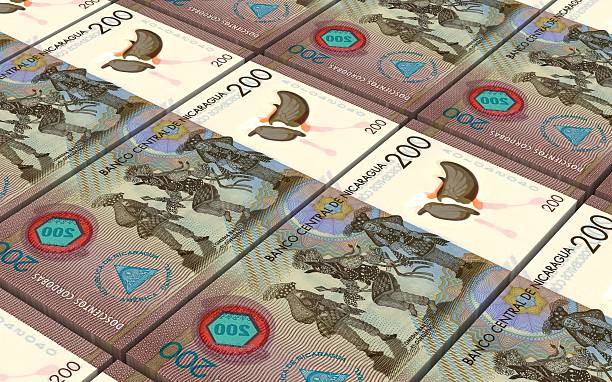 istock Nicaraguan cordoba bills stacks background. 508191278
