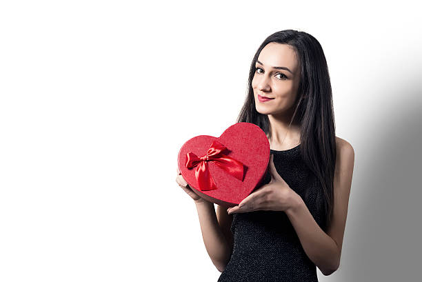 istock Woman with a gift box 508192838