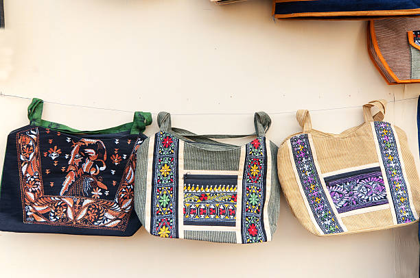 Kolkata, West Bengal, India - January 12, 2014: Designer bags , Artworks of handicraft, displayed at Handicraft Fair in Kolkata - the biggest handicrafts fair in Asia.
