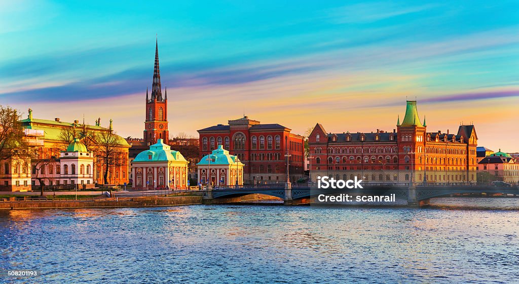 Old Town in Stockholm, Sweden Scenic summer panorama of the Old Town (Gamla Stan) architecture pier in Stockholm, Sweden Architecture Stock Photo
