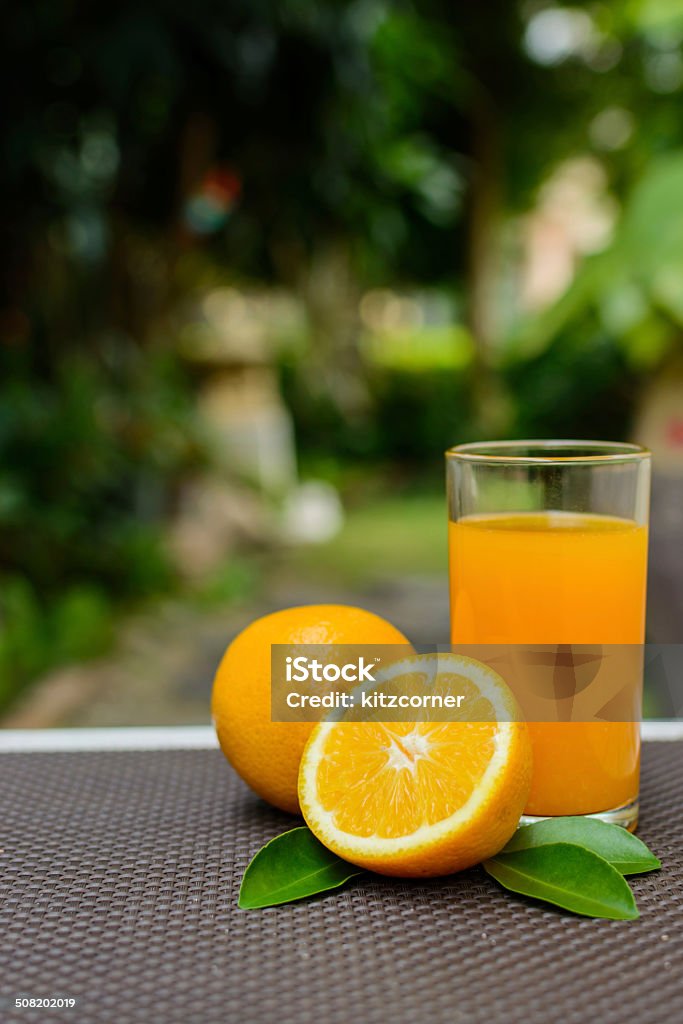 Orange juice Close up of orange juice in the garden Close-up Stock Photo