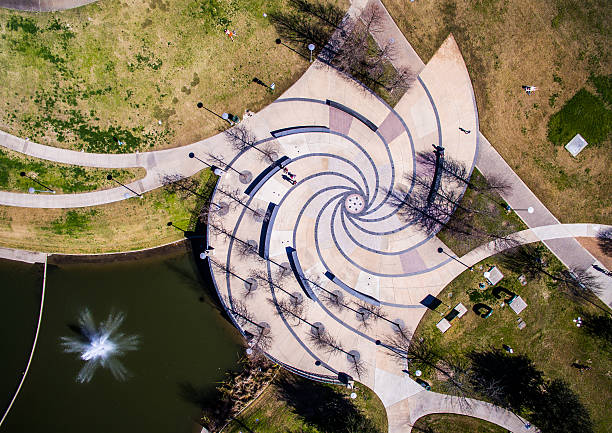 Aerial Directly down on Butler Park Fountains Circle Patterns. Abstract Artistic Architecture shows amazing view of Austin Texas park areas with amazing layouts 