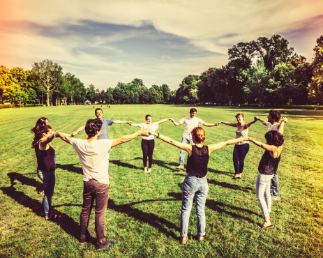 Group of Friends Making a Circle, Holding Hands