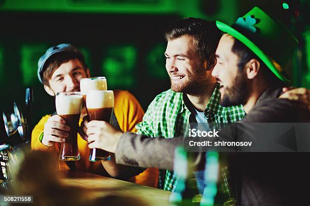 Celebration Stock Photo - Download Image Now - St. Patrick's Day, Bar - Drink Establishment, Celebratory Toast