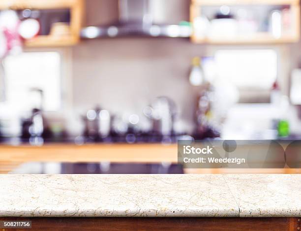 Empty Marble Table Top And Blurred Kitchen Bokeh Light Stock Photo - Download Image Now