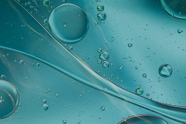 istock Abstract pattern of colored oil bubbles on water 508211949