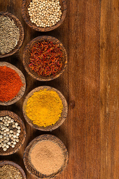 istock Variation of spices on a wooden background 508212821