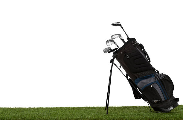 istock Golf bag and clubs on grass isolated on white 508214317
