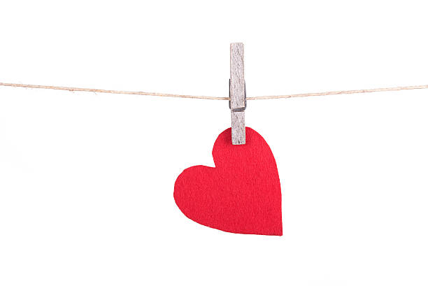 istock Red heart hanging a rope 508214506