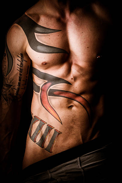 Trained Body With Tattoo Stock Photo - Download Image Now - Tattoo, Men, Fashion Model - iStock Trained Body With Tattoo Stock Photo - Download Image Now - Tattoo, Men, Fashion Model - iStock