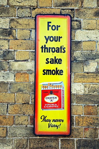 Arley, United Kingdom - July 10, 2014:  Old retro tin Craven Cigarettes advertisement, Severn Valley Railway, Arley, Worcestershire, England, UK, Western Europe.