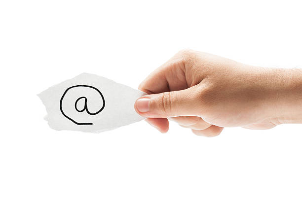 symbole de l'email - men suit holding human finger photos et images de collection