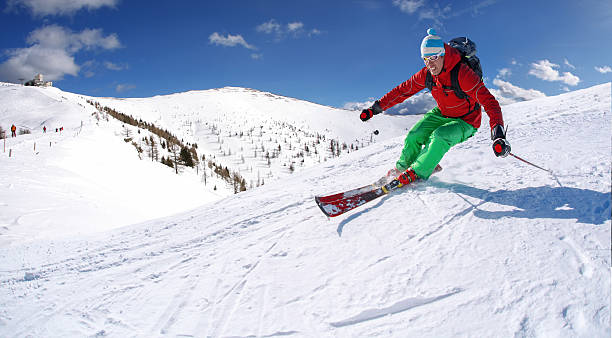 istock Skier skiing downhill in high mountains against sunset 508216829