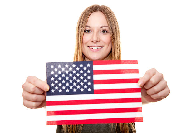 Young woman holding US flag