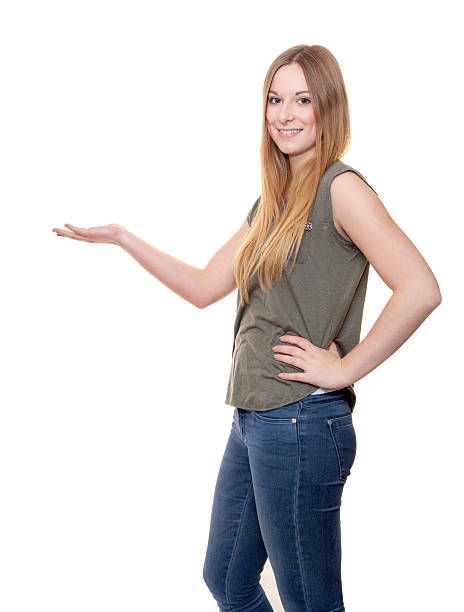 istock Young woman pointing to the side 508218688