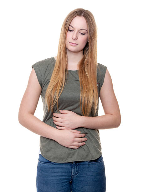 istock Young woman suffers from stomachache 508219662