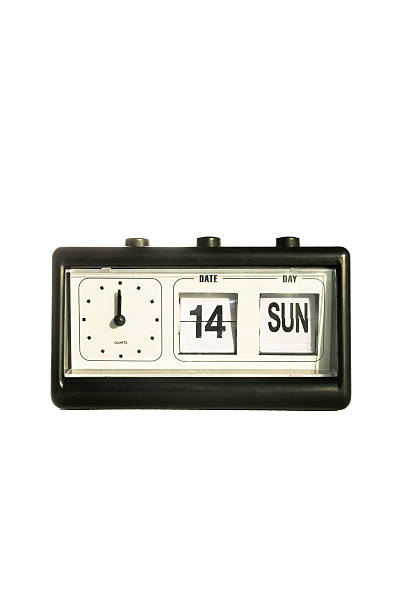 Flip clock and calendar retro style in white background Flip clock and calendar retro style in white background which set time at twelve on sunday 14  flip calendar stock pictures, royalty-free photos & images