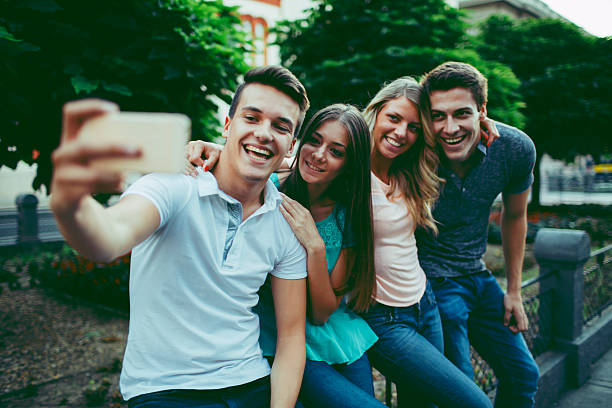istock Friends Making Selfie With Smart Phone In Park 508222684