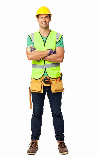 operaio edile in piedi braccia incrociate - manual worker full length isolated on white standing foto e immagini stock