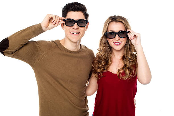 istock Young couple posing to camera with shades on 508230329