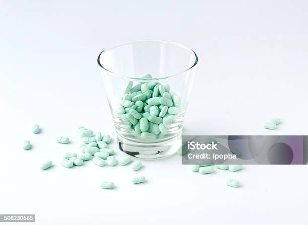 Pills In The Glass Stock Photo - Download Image Now - Addiction, Antibiotic, Care