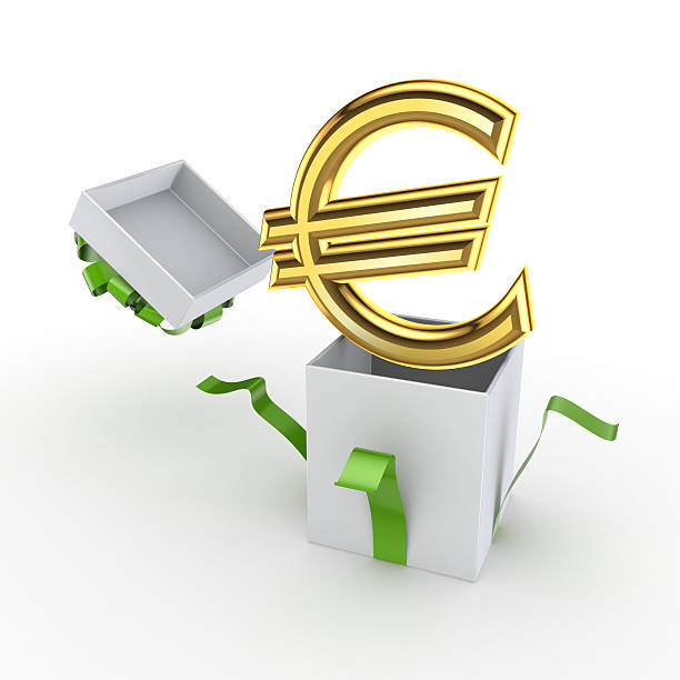 Golden euro sign in a gift box. stock photo