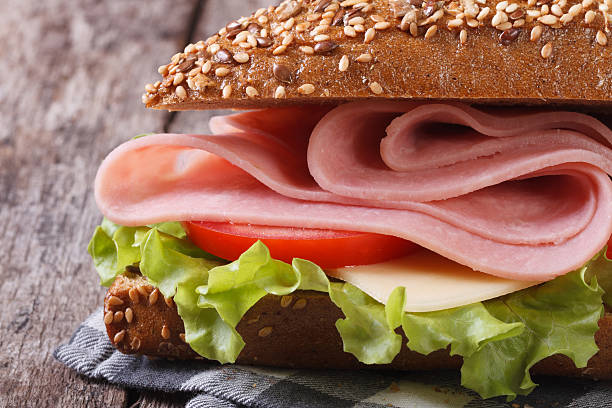 istock Sandwich with ham, cheese, lettuce and tomatoes 508234701
