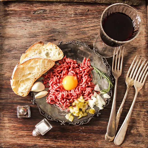 Photo of beer snack Beef tartare with pickled cucumber