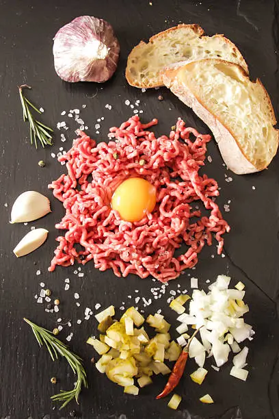 Photo of beer snack Beef tartare with pickled cucumber