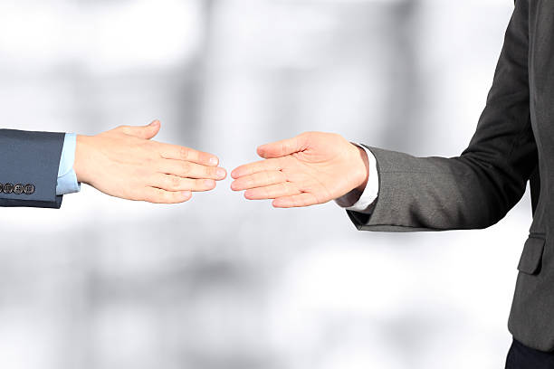 istock The firm handshake  between two colleagues in office. 508248730