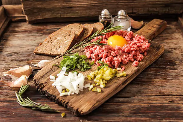 Photo of beer snack Beef tartare with pickled cucumber