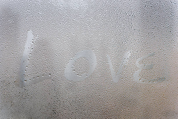istock Love text draw on surface of window 508248994