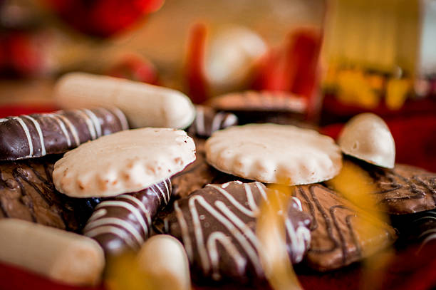 istock Chocolate cookies on white textile with ribbons 508249746