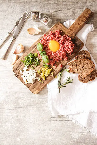 Photo of beer snack Beef tartare with pickled cucumber