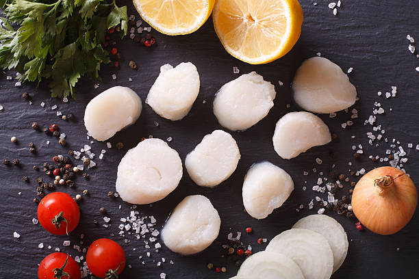 istock Raw scallops and ingredients for cooking close-up. horizontal 508250852