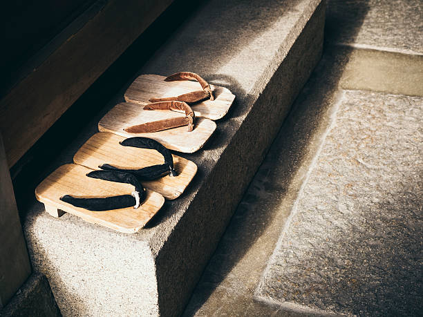 Japan Traditional Footwear Zori in Japanese home Japan Traditional Footwear Zori in Japanese home Travel Culture concept geta sandal stock pictures, royalty-free photos & images