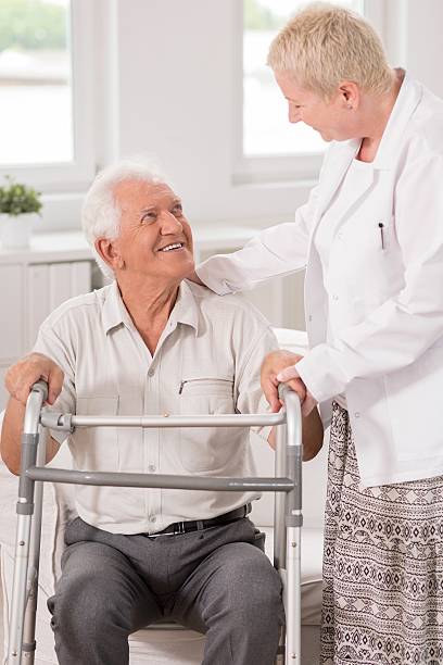istock Professional carer helping her patient 508253066