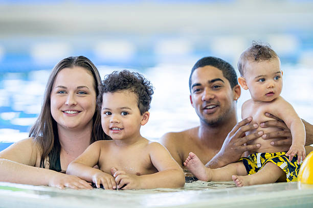 istock Family Spending Quality Time at the Pool 508254098